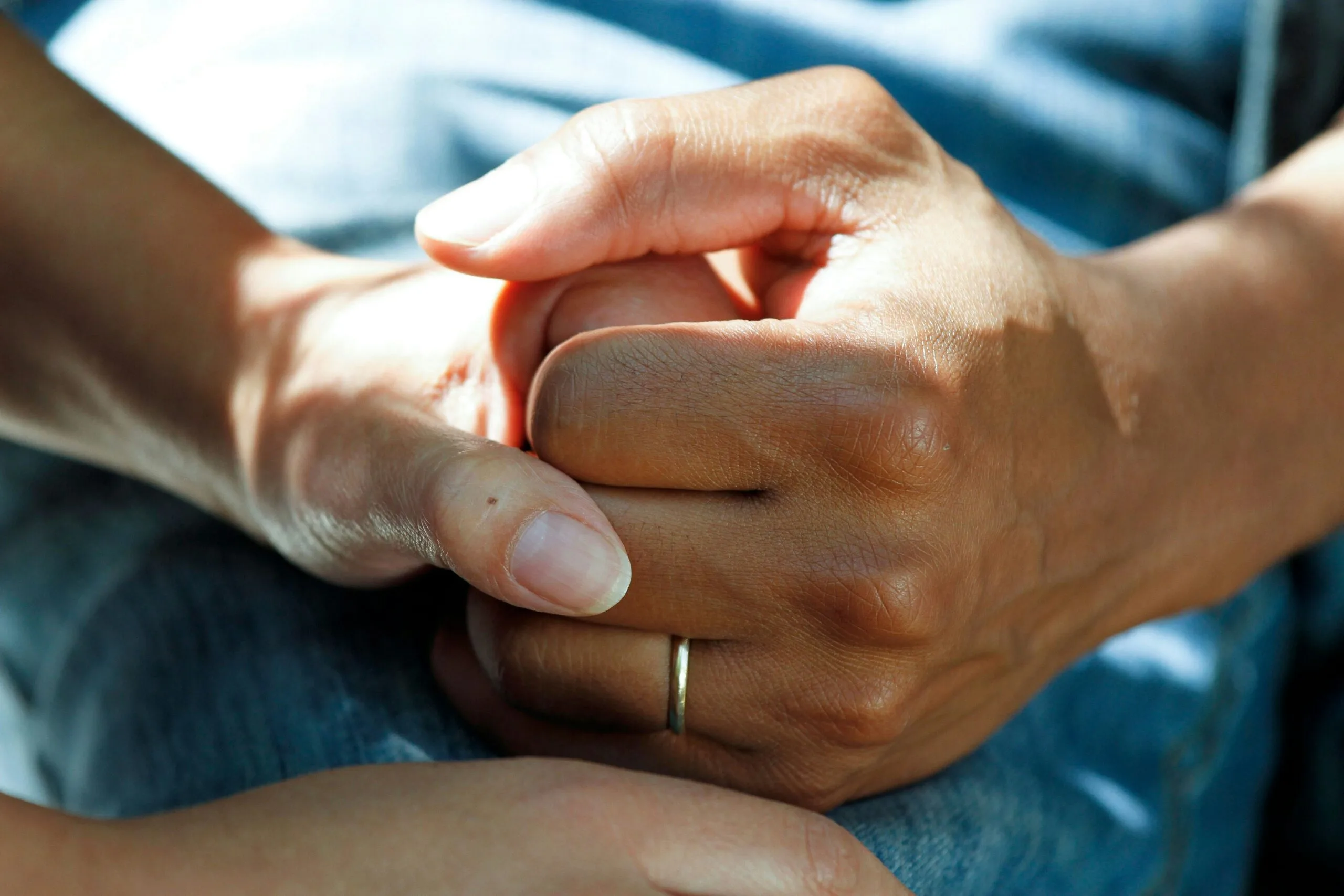 Doctor reviewing hand condition