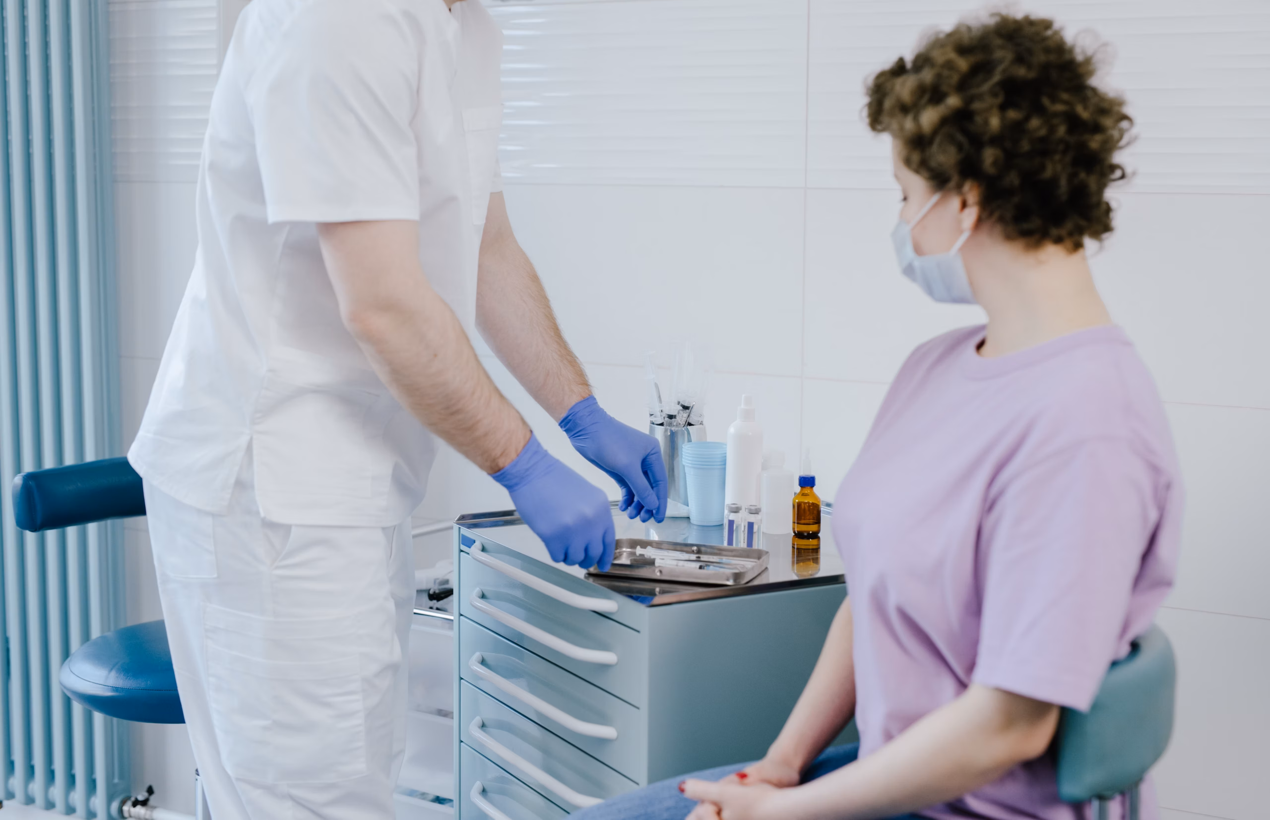 Doctor assessing hand and wrist movement